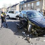 Botsing tegen geparkeerde auto op Maaslandlaan